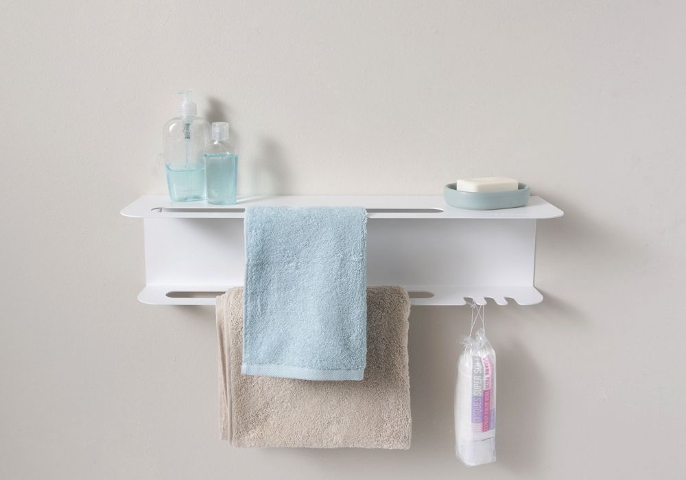 White bathroom shelf shop with towel hooks